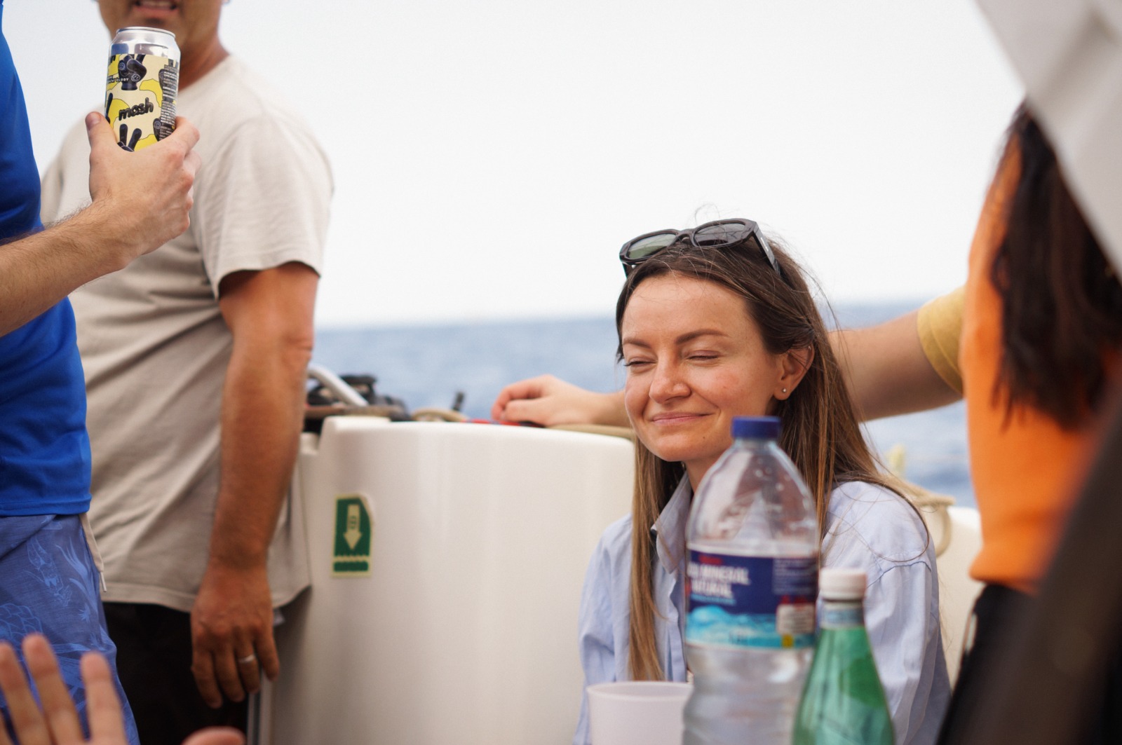 Guests sharing a laugh on deck