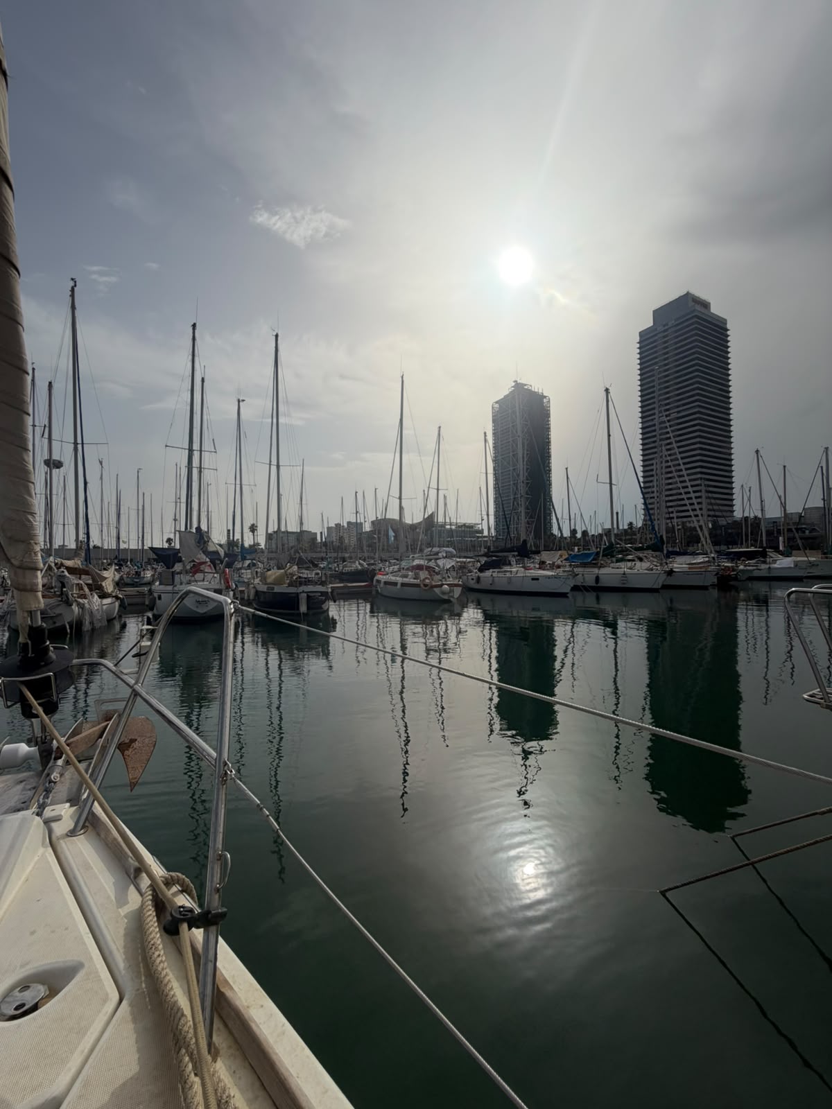 The marina at golden hour, seen from the bow