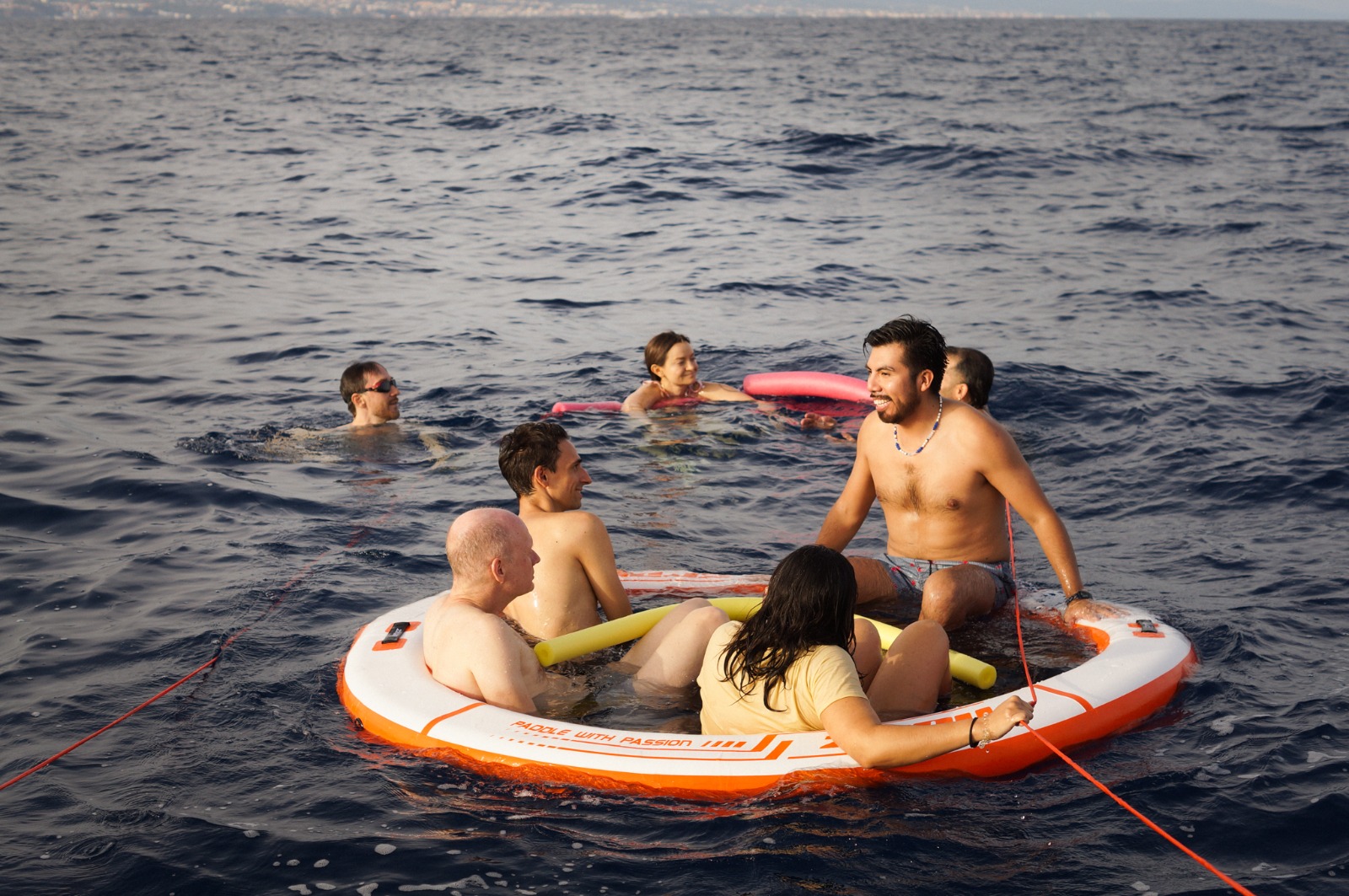 Guests cooling off together during the swim stop