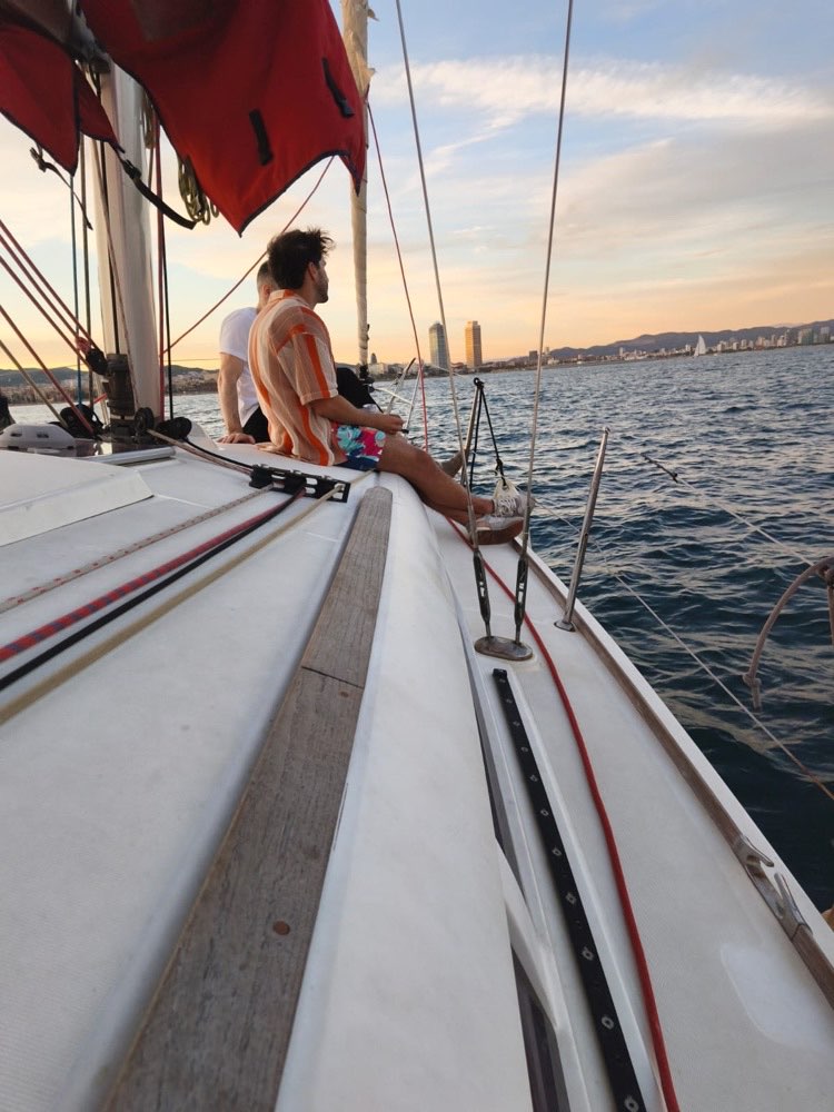 A guest taking in the sunset from the bow, Edition 02